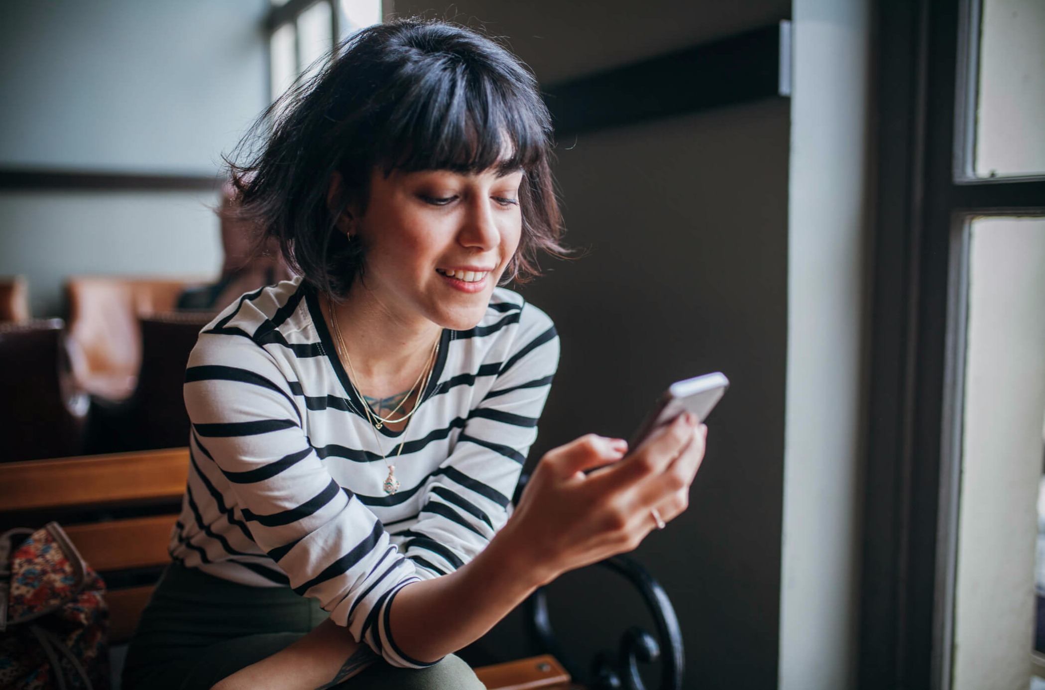 happy small bussiness owner with our payroll solutions that meet your business's accounting needs